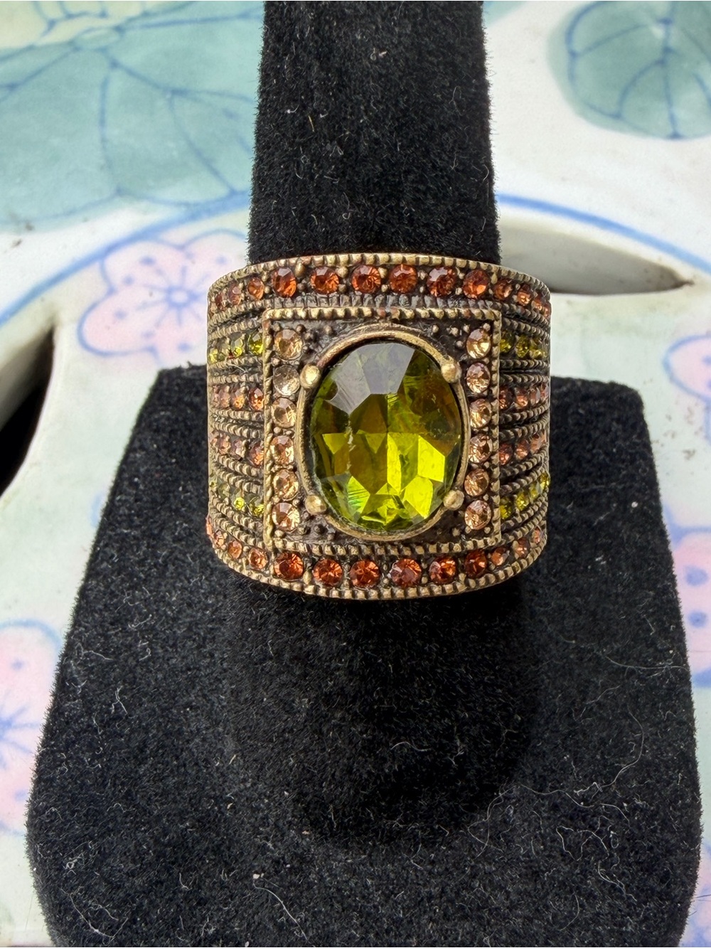 Heidi Daus Brass Tone Antique Design Olivine Green Stone Ring. *Size 6.5